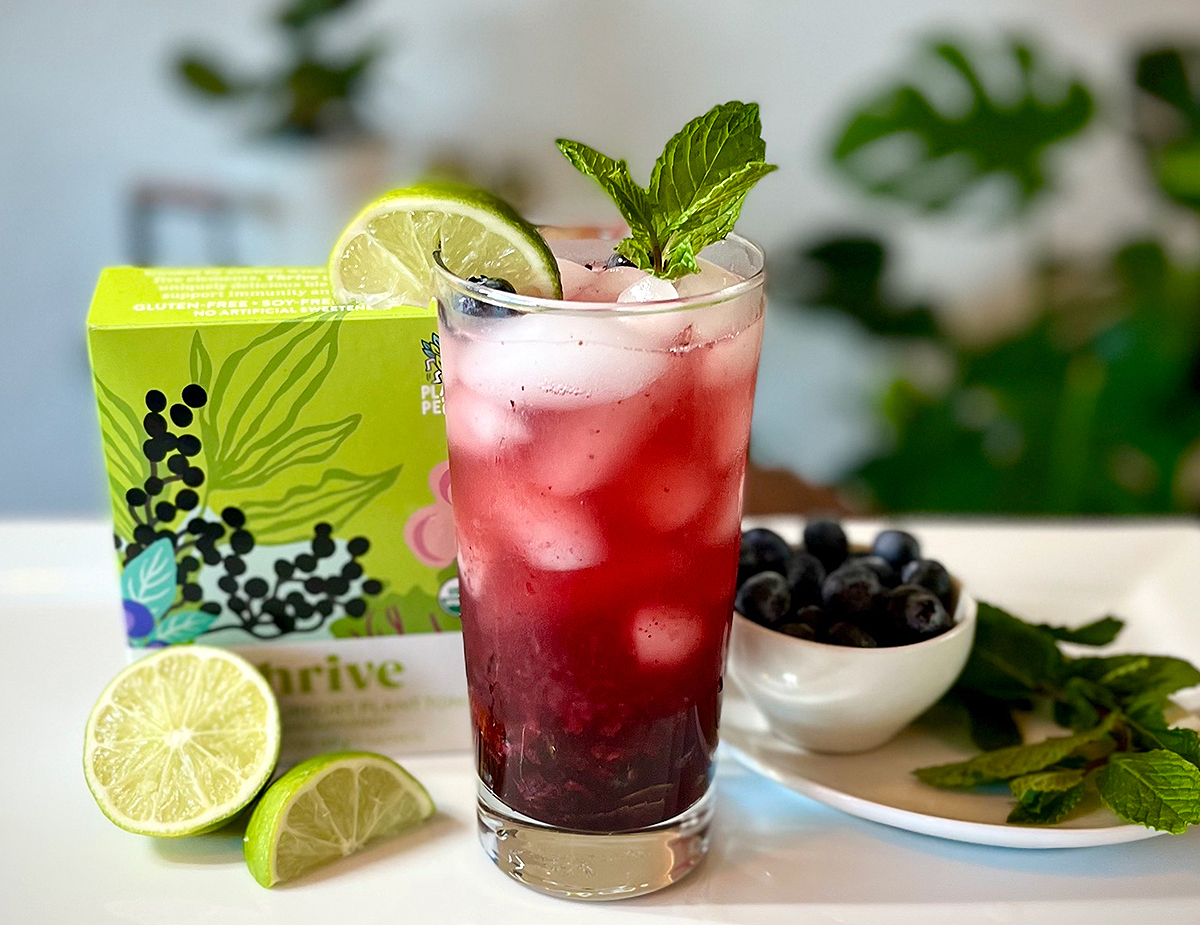 Thrive mocktail with lime and elderberries